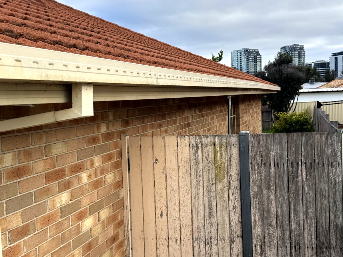 Cream gutters, fascia and downpipes before repainting, Gungahlin