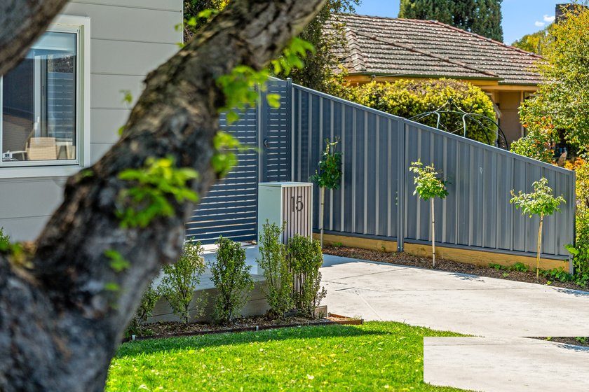 Landscaped side access with new fencing