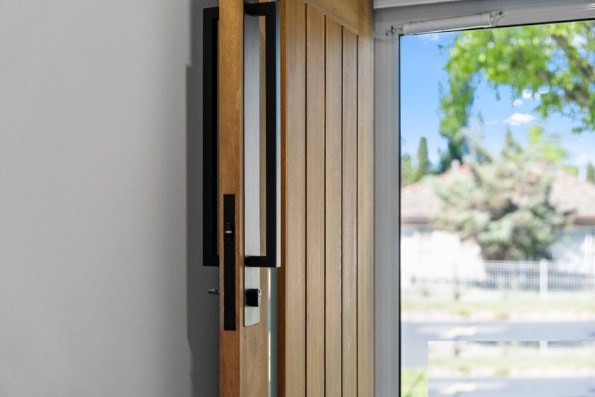 Timber-clad front door detail