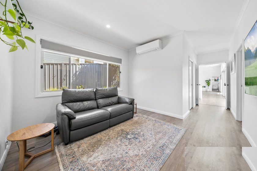 Living room and hallway with split system
