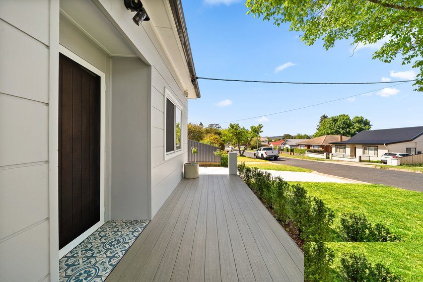 New front entry deck with patterned tiles