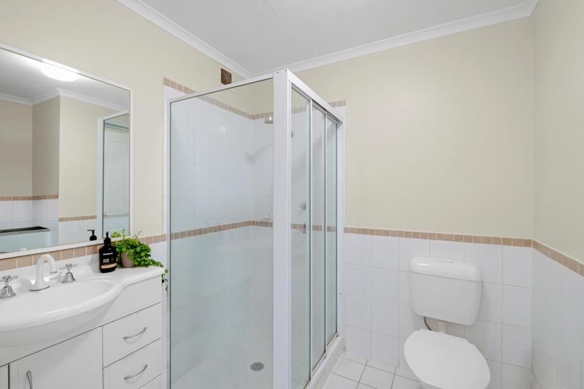 Crisp white bathroom finish in a Canberra property