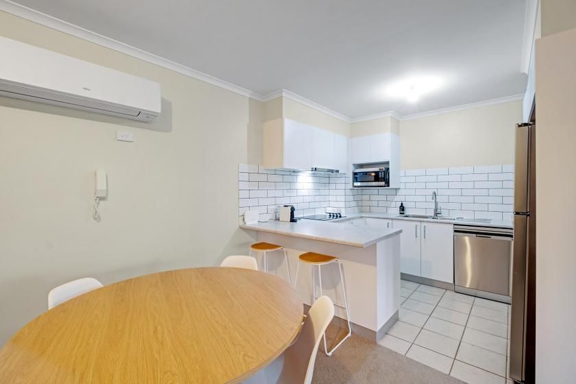Clean, bright kitchen presentation by a Canberra painter